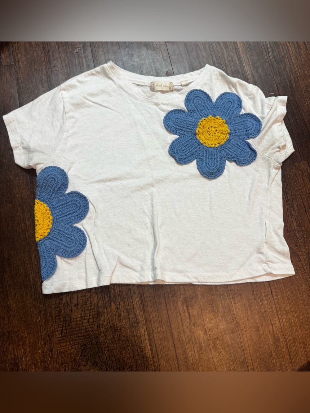 Altar'd State White Crop Tee with Blue and Yellow Crochet Flowers